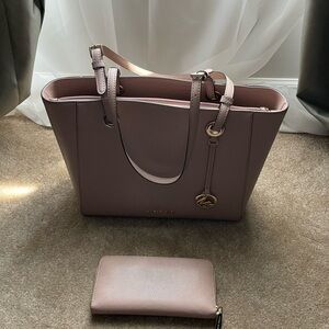 Lovely Michael Kors purse WITH the matching wallet AND the matching wristlet.
